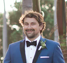Eric wearing a tuxedo at an event
